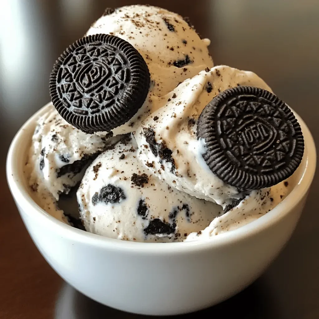 A bowl of Healthy Oreo Ice Cream topped with Oreo cookies, showcasing creamy texture and cookie crumbles.